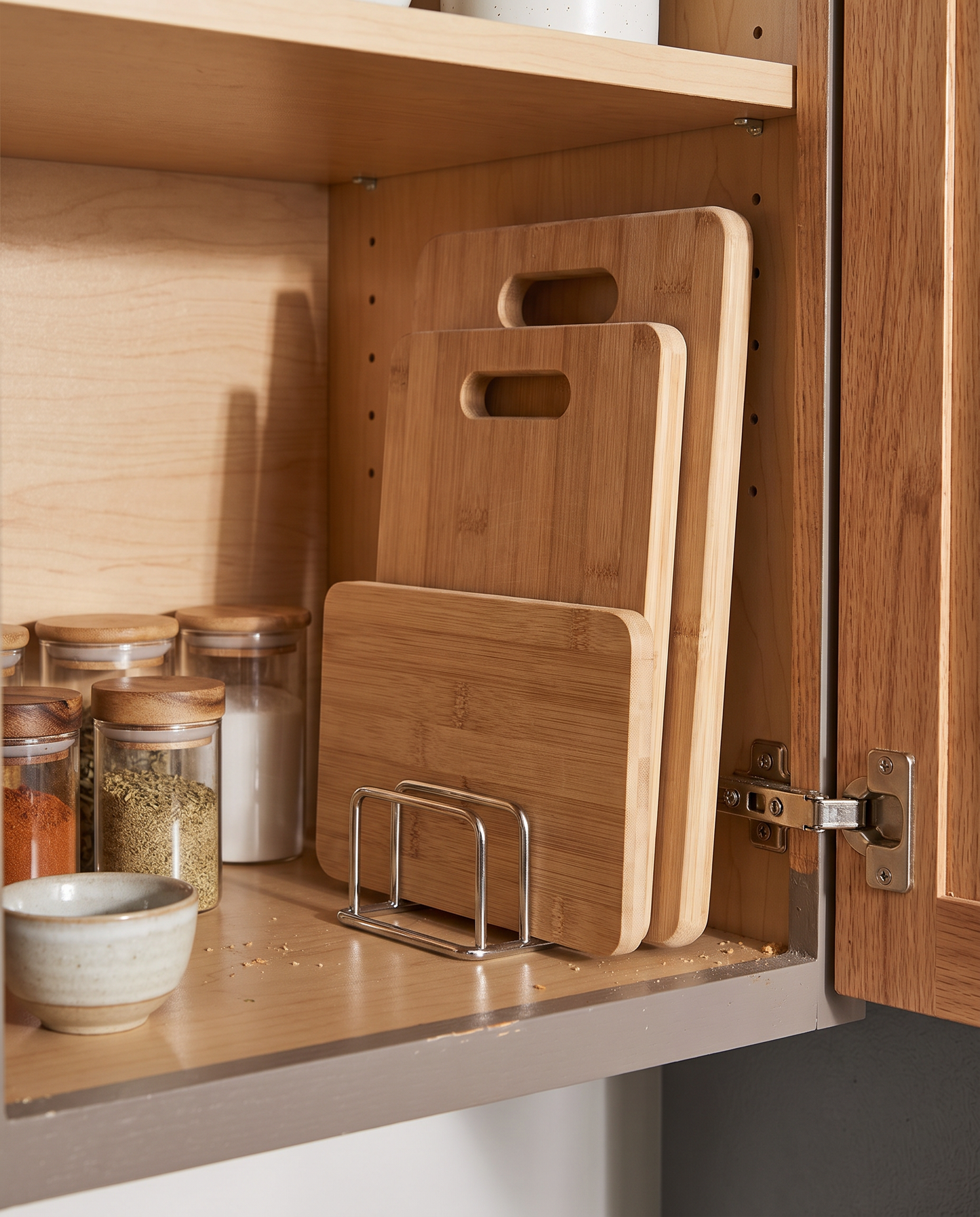 Stainless Steel Pot Lid & Cutting Board Organizer in a practical small-space lifestyle setting