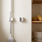 1/4-Piece No-Drill Wall-Mounted Broom & Mop Clips in a practical small-space lifestyle setting