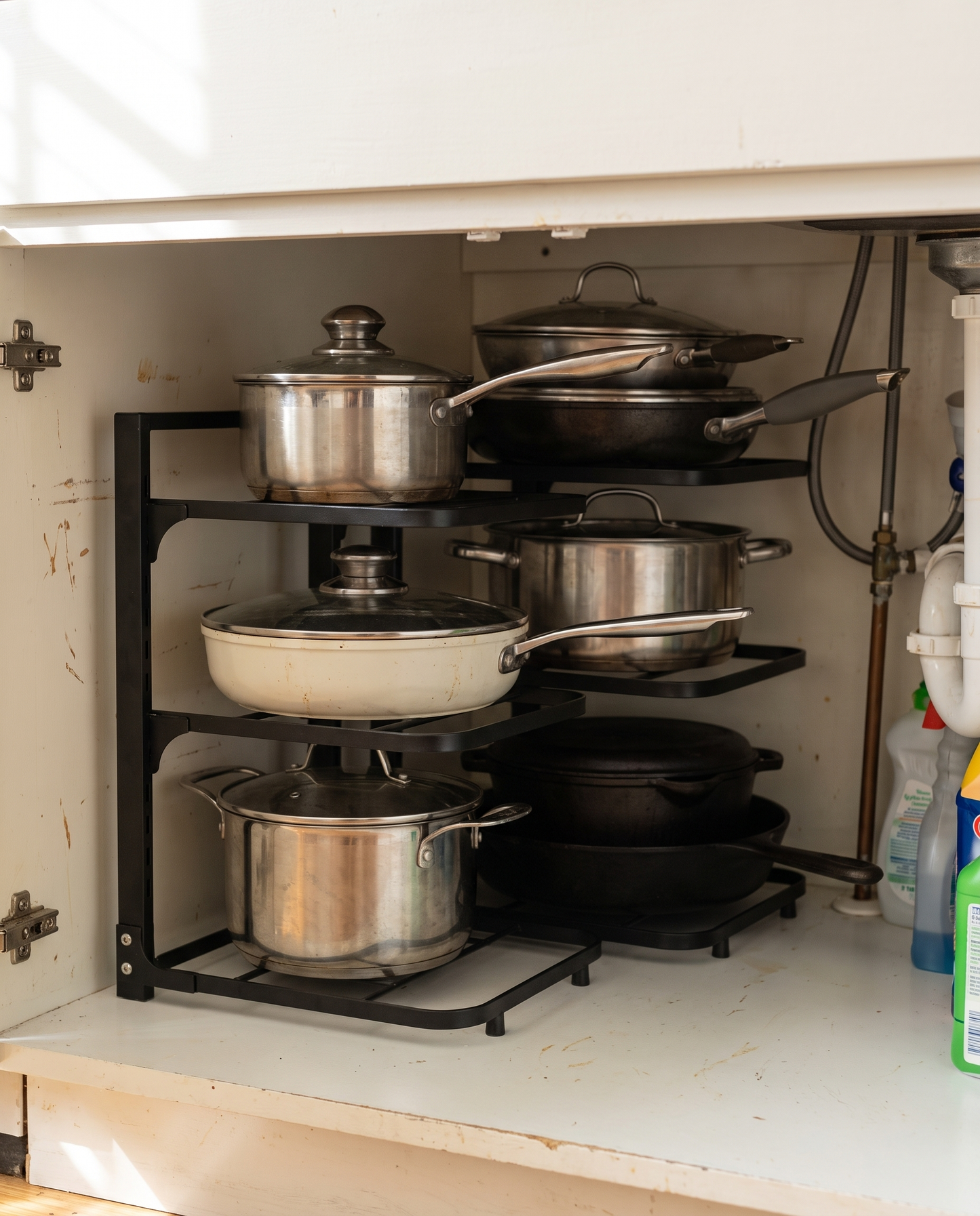 Adjustable Stainless Steel Pot & Pan Organizer in a practical small-space lifestyle setting