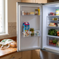Expandable Adjustable Refrigerator Divider in a practical small-space lifestyle setting