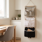 Hanging Wall & Over-Door Storage Caddy in an everyday small-space setting