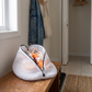 Zippered Mesh Shoe Laundry Bag in a practical small-space lifestyle setting