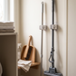 Adhesive Multi-Purpose Wall Hooks for Brooms & Mops in a practical small-space lifestyle setting
