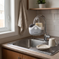 Plastic Sink Caddy with Drainage in a practical small-space lifestyle setting