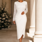 Woman wearing a white long-sleeve lace dress with wrap-style skirt
